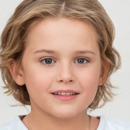 Joyful white child female with medium  brown hair and grey eyes