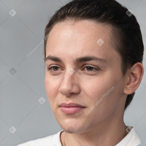 Joyful white young-adult female with short  brown hair and brown eyes