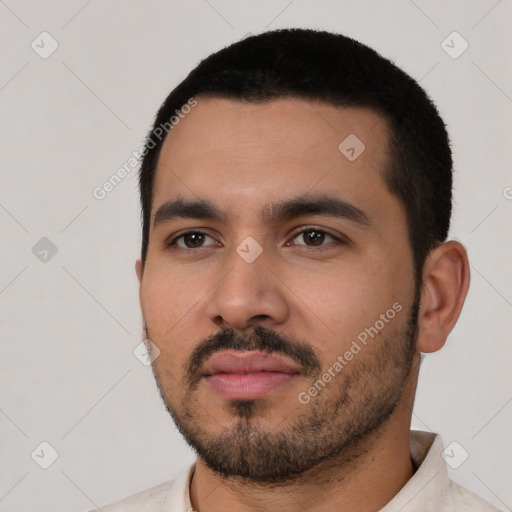 Neutral latino young-adult male with short  black hair and brown eyes