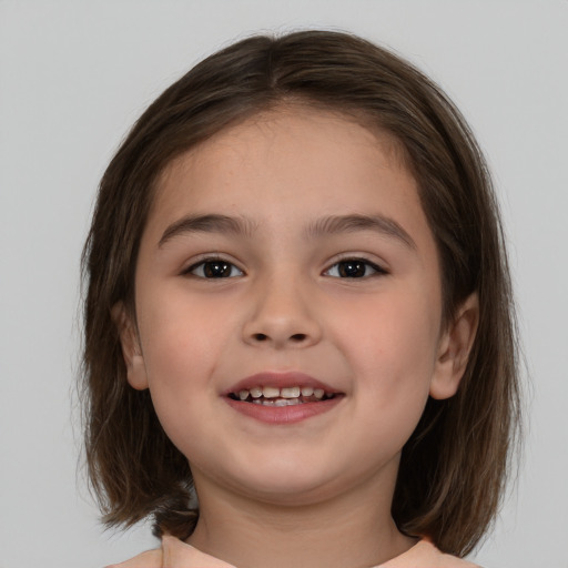 Joyful white child female with medium  brown hair and brown eyes