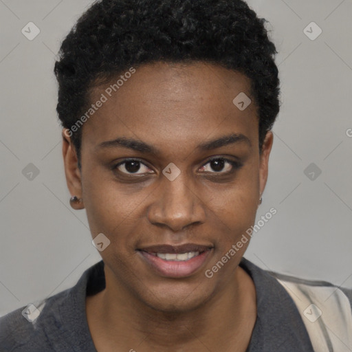 Joyful black young-adult female with short  black hair and brown eyes