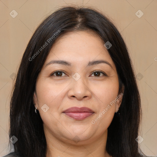 Joyful white adult female with long  brown hair and brown eyes