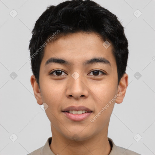 Joyful asian young-adult male with short  black hair and brown eyes