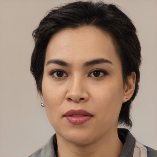 Neutral latino young-adult female with medium  black hair and brown eyes
