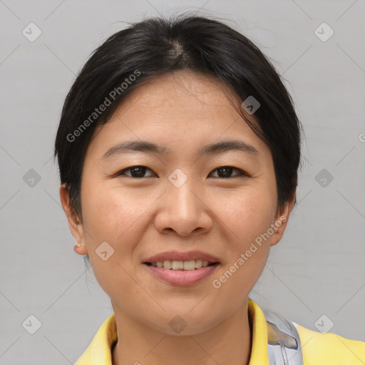 Joyful asian young-adult female with medium  brown hair and brown eyes