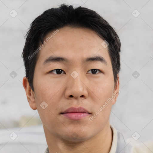 Neutral asian young-adult male with short  brown hair and brown eyes