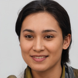 Joyful asian young-adult female with medium  brown hair and brown eyes