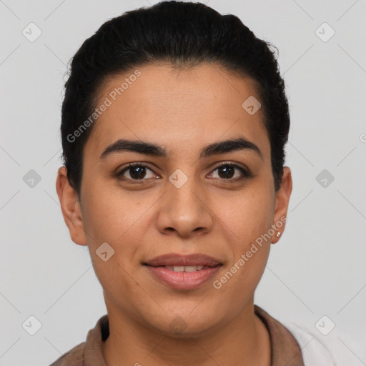 Joyful latino young-adult female with short  brown hair and brown eyes