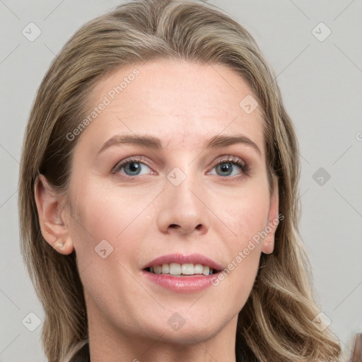 Joyful white young-adult female with long  brown hair and blue eyes