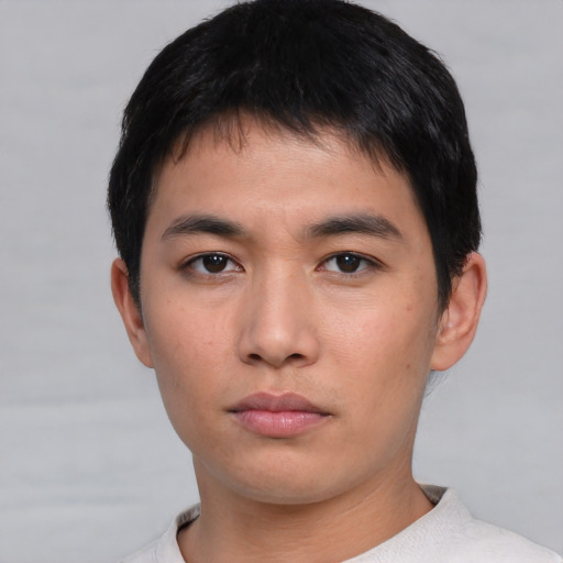 Neutral asian young-adult male with short  brown hair and brown eyes
