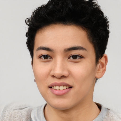 Joyful asian young-adult female with short  brown hair and brown eyes