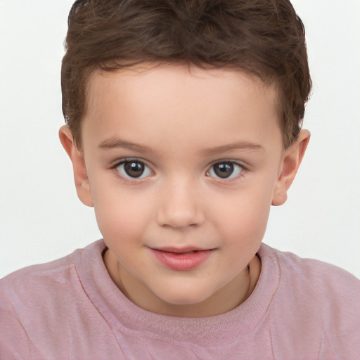 Joyful white child female with short  brown hair and brown eyes