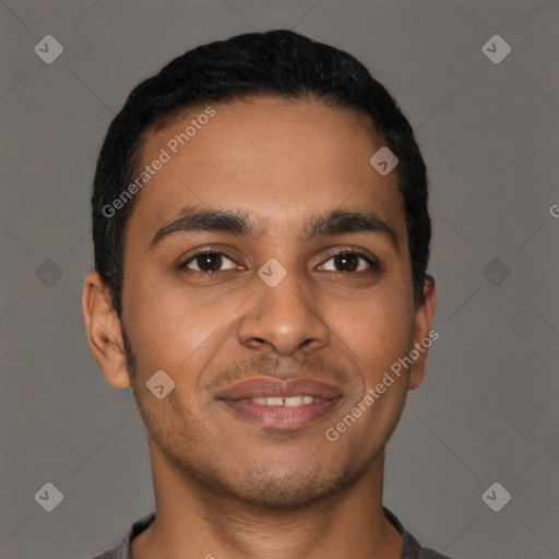 Joyful latino young-adult male with short  brown hair and brown eyes