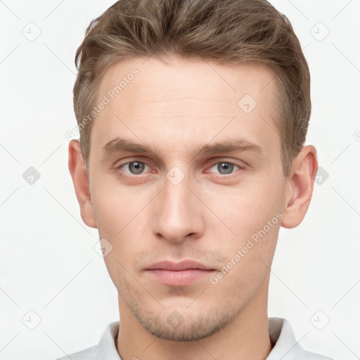 Neutral white young-adult male with short  brown hair and grey eyes