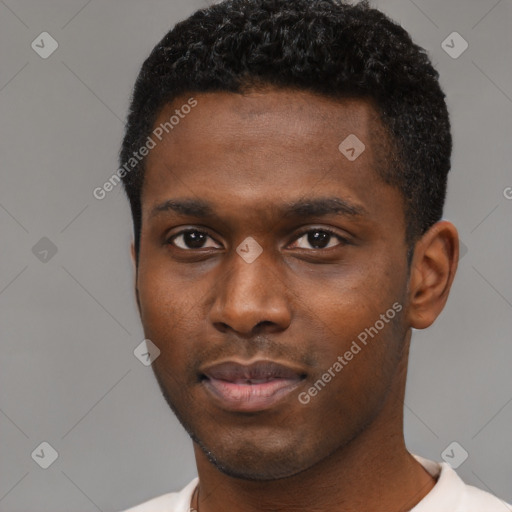 Neutral black young-adult male with short  brown hair and brown eyes