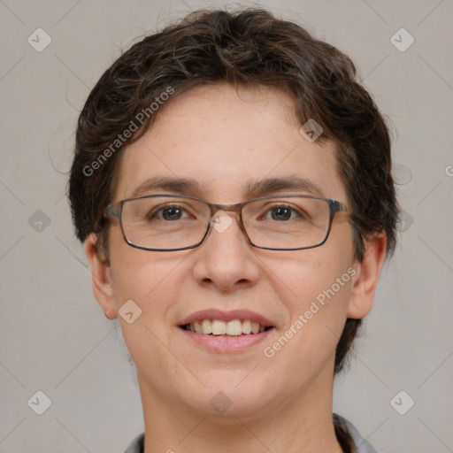 Joyful white adult female with short  brown hair and brown eyes