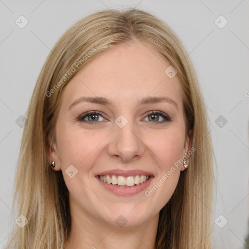 Joyful white young-adult female with long  brown hair and grey eyes