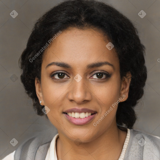 Joyful black young-adult female with long  black hair and brown eyes