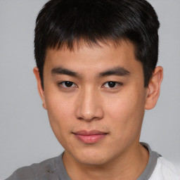 Neutral asian young-adult male with short  brown hair and brown eyes