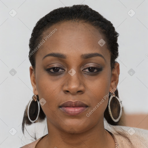 Joyful black young-adult female with short  black hair and brown eyes