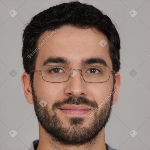 Joyful white young-adult male with short  black hair and brown eyes