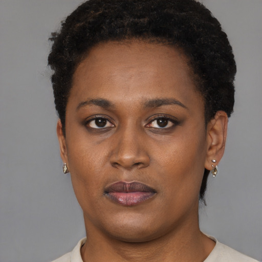 Neutral black young-adult female with short  black hair and brown eyes