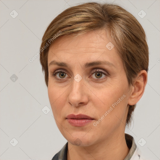 Joyful white adult female with short  brown hair and brown eyes