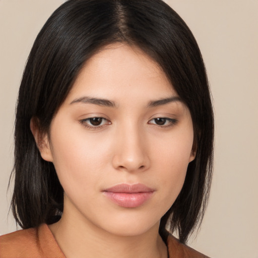 Neutral asian young-adult female with medium  brown hair and brown eyes