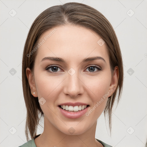 Joyful white young-adult female with medium  brown hair and grey eyes