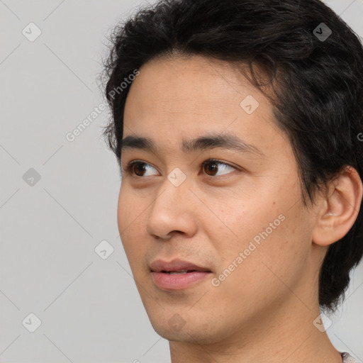 Neutral white young-adult male with short  black hair and brown eyes