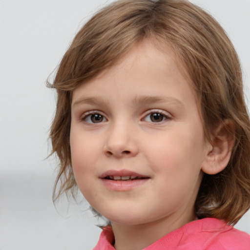 Joyful white child female with medium  brown hair and brown eyes