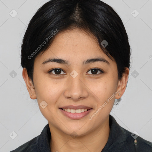 Joyful asian young-adult female with medium  brown hair and brown eyes