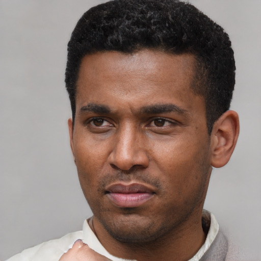 Neutral latino young-adult male with short  black hair and brown eyes
