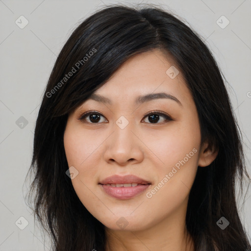 Joyful asian young-adult female with long  brown hair and brown eyes