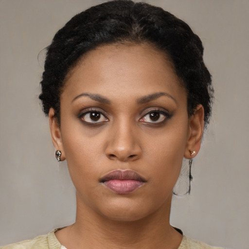 Neutral latino young-adult female with short  black hair and brown eyes