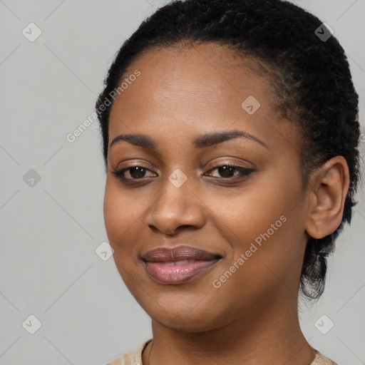 Joyful black young-adult female with medium  black hair and brown eyes