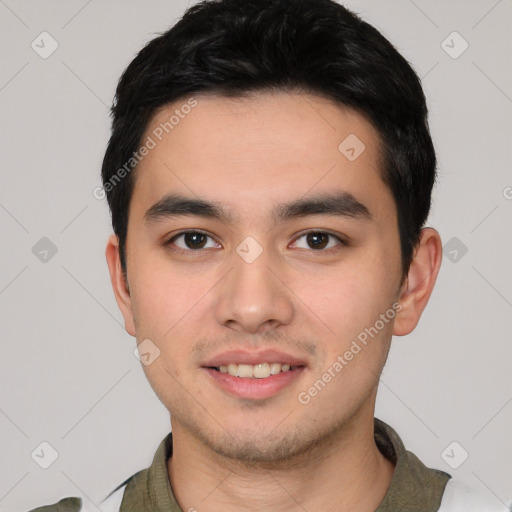 Joyful white young-adult male with short  black hair and brown eyes