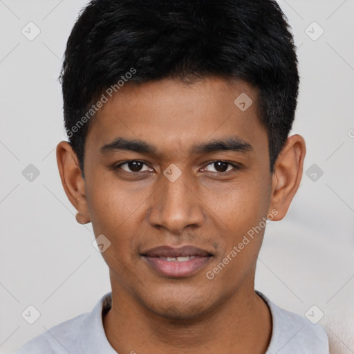 Joyful asian young-adult male with short  black hair and brown eyes