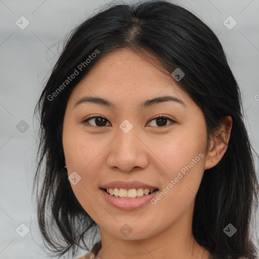 Joyful asian young-adult female with long  brown hair and brown eyes