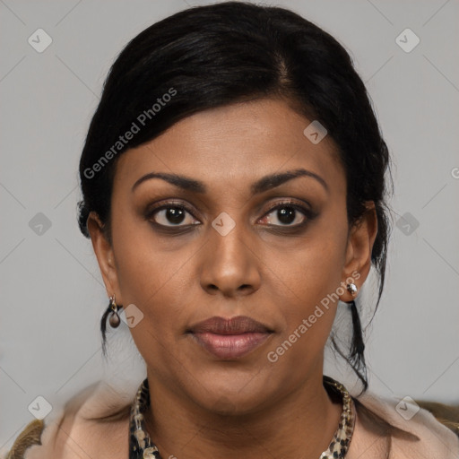 Joyful latino young-adult female with short  black hair and brown eyes