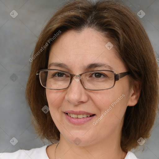 Joyful white adult female with medium  brown hair and brown eyes