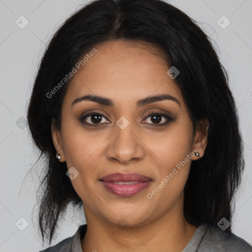 Joyful latino young-adult female with medium  brown hair and brown eyes