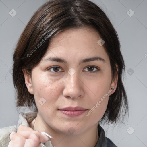 Joyful white young-adult female with medium  brown hair and brown eyes