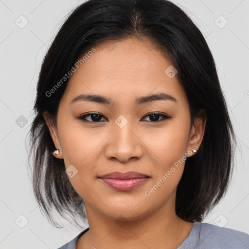 Joyful asian young-adult female with medium  brown hair and brown eyes