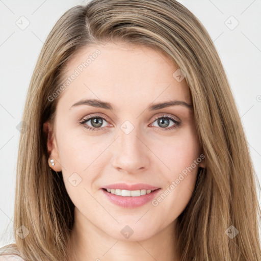 Joyful white young-adult female with long  brown hair and green eyes