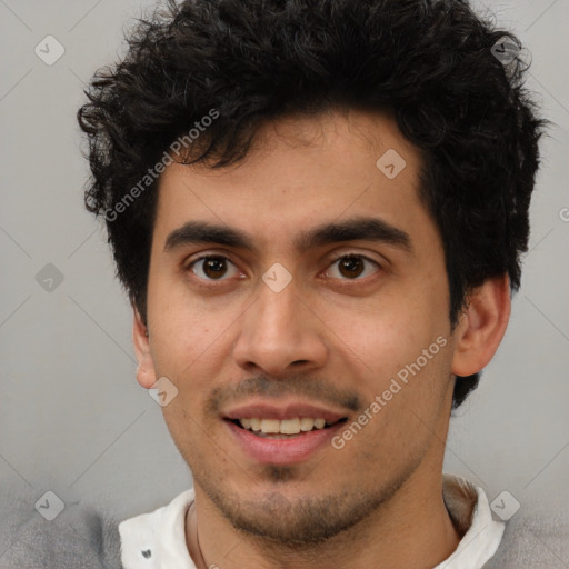 Joyful white young-adult male with short  black hair and brown eyes