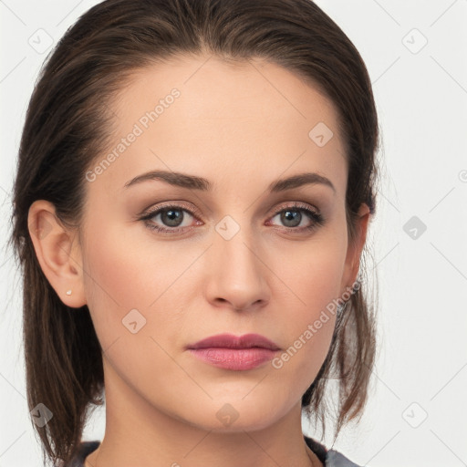 Neutral white young-adult female with medium  brown hair and grey eyes