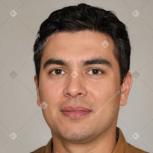 Joyful white young-adult male with short  black hair and brown eyes