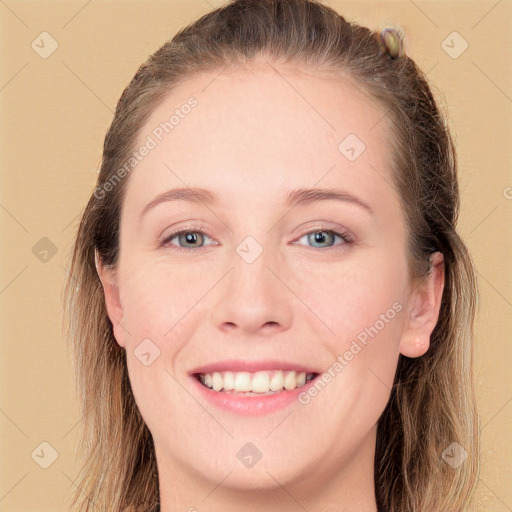 Joyful white young-adult female with long  brown hair and grey eyes