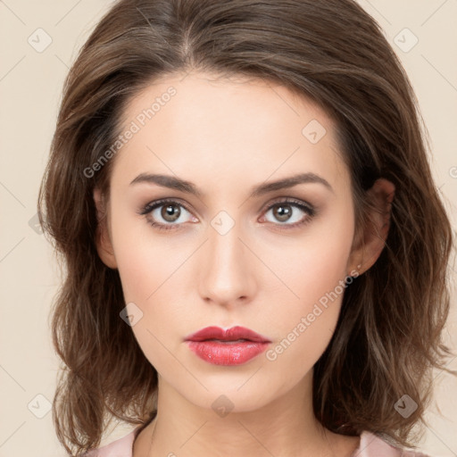 Neutral white young-adult female with long  brown hair and brown eyes